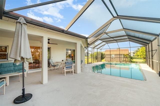 3425 Magnolia Way, Punta Gorda, FL 33950 - swimming pool featuring a patio area, a storage unit, a ceiling fan, and glass enclosure