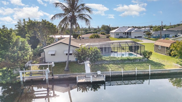 3425 Magnolia Way, Punta Gorda, FL 33950 - dock featuring a residential view, a lawn, and a water view