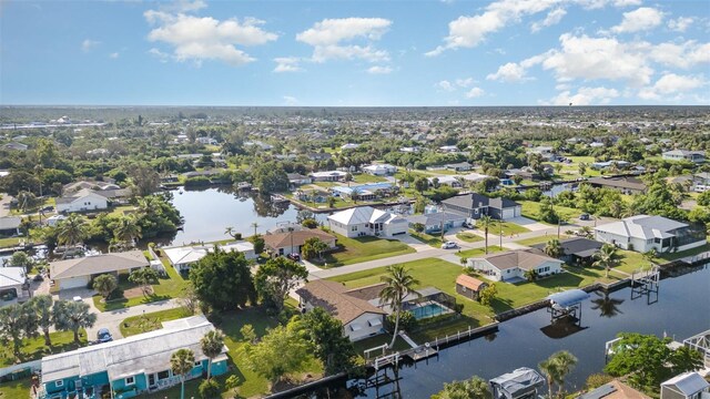3425 Magnolia Way, Punta Gorda, FL 33950 - aerial perspective of suburban area with a nearby body of water