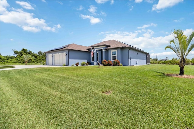 13416 Trascoro Ln, Port Charlotte, FL 33981 - ranch-style home featuring a garage, stucco siding, driveway, a front yard, and roof mounted solar panels