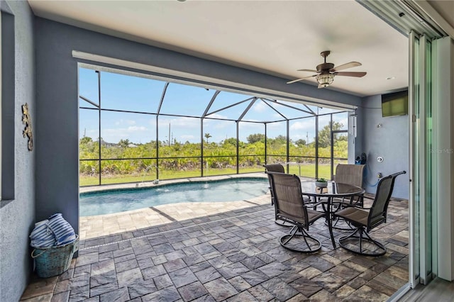 13416 Trascoro Ln, Port Charlotte, FL 33981 - view of patio / terrace featuring a ceiling fan, an outdoor pool, and glass enclosure