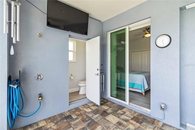 13416 Trascoro Ln, Port Charlotte, FL 33981 - doorway to property featuring stucco siding