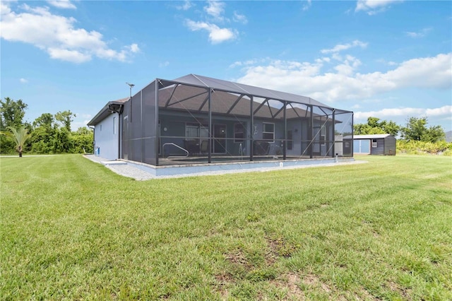 13416 Trascoro Ln, Port Charlotte, FL 33981 - back of house featuring a storage unit, a yard, and a lanai