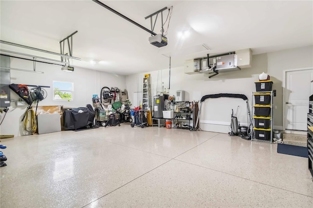 13416 Trascoro Ln, Port Charlotte, FL 33981 - garage with a garage door opener and electric water heater