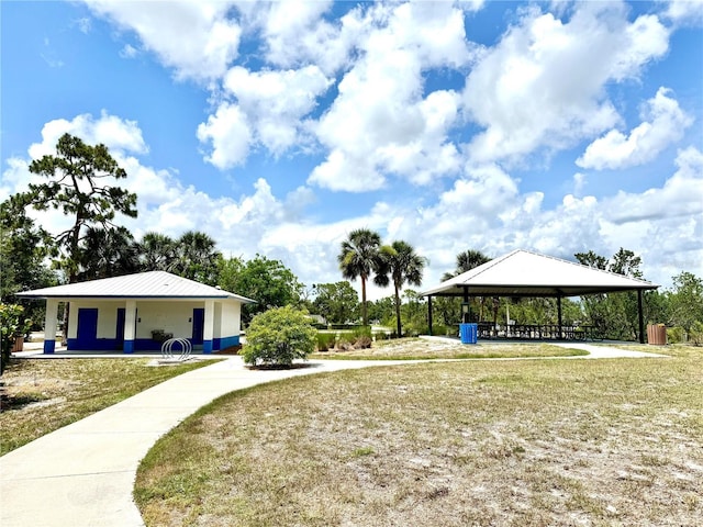 13416 Trascoro Ln, Port Charlotte, FL 33981 - view of grassy yard featuring a gazebo and a carport