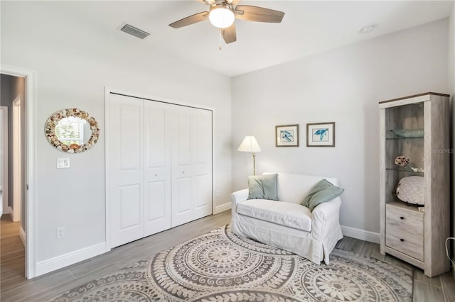 13416 Trascoro Ln, Port Charlotte, FL 33981 - living area with wood finished floors and ceiling fan