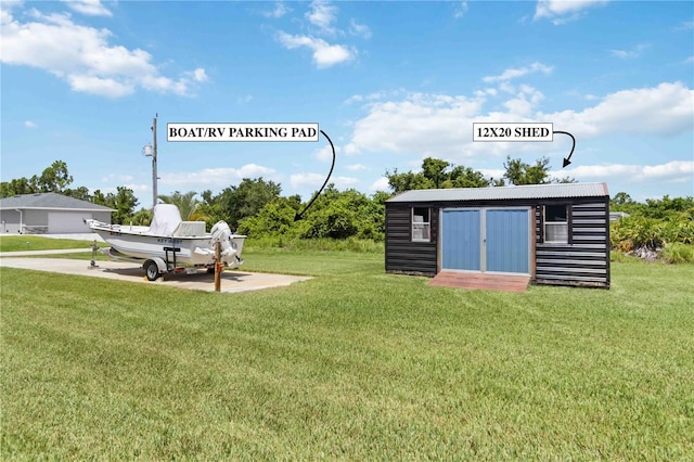 13416 Trascoro Ln, Port Charlotte, FL 33981 - view of green lawn with a storage unit