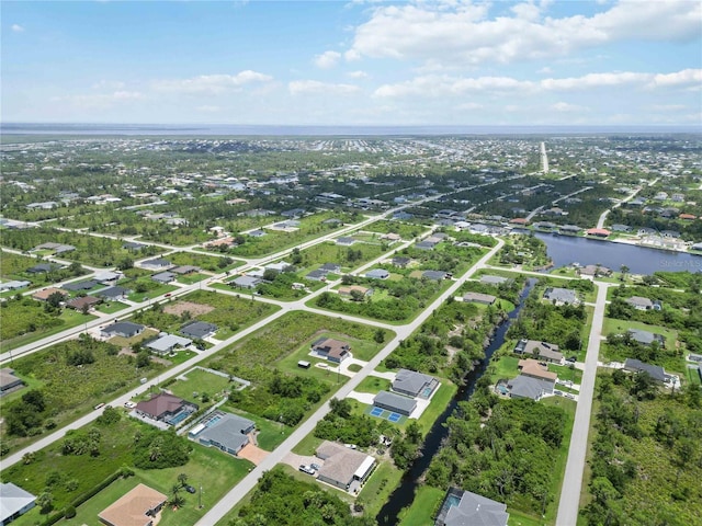 13416 Trascoro Ln, Port Charlotte, FL 33981 - aerial overview of property's location with a nearby body of water and nearby suburban area