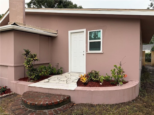 3902 Locust Ave, Sarasota, FL 34234 - property entrance with stucco siding