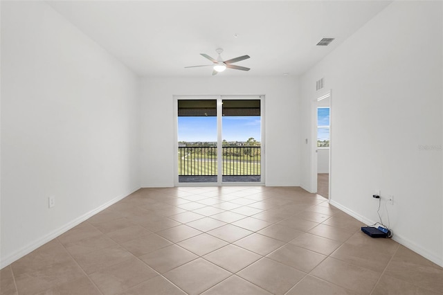 17565 Opal Sand Dr Unit 403, Venice, FL 34293 - spare room with light tile patterned floors and a ceiling fan