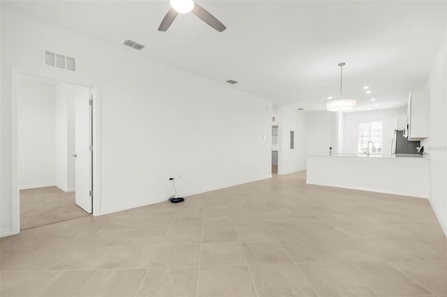 17565 Opal Sand Dr Unit 403, Venice, FL 34293 - unfurnished living room featuring ceiling fan and recessed lighting