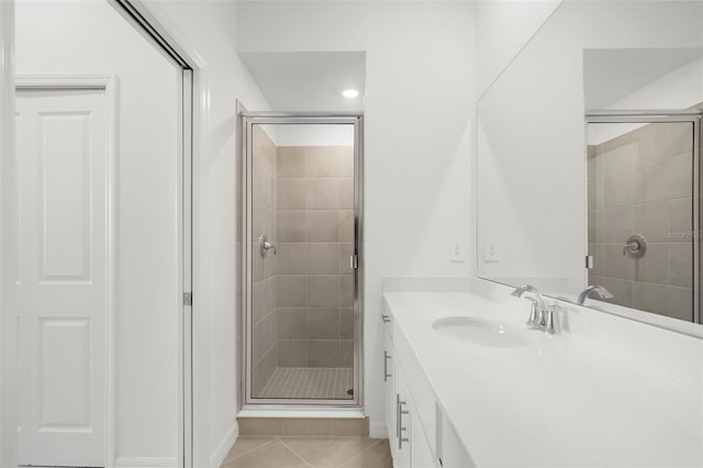 17565 Opal Sand Dr Unit 403, Venice, FL 34293 - full bath featuring vanity, a stall shower, tile patterned floors, and recessed lighting