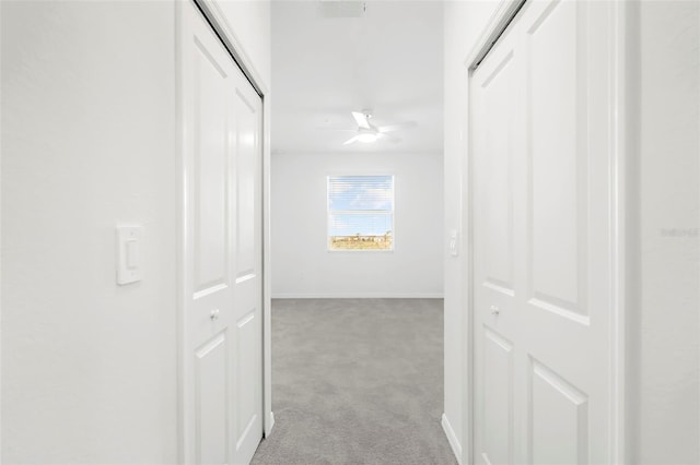 17565 Opal Sand Dr Unit 403, Venice, FL 34293 - hallway featuring carpet and baseboards