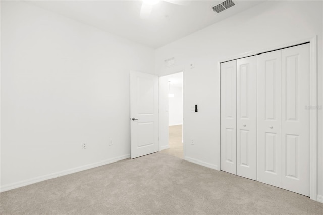 17565 Opal Sand Dr Unit 403, Venice, FL 34293 - unfurnished bedroom with carpet flooring, a closet, and a ceiling fan