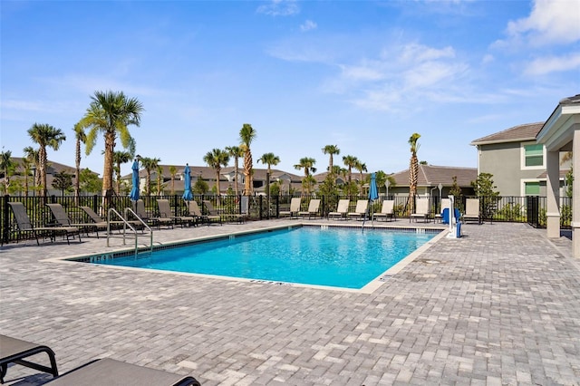 17565 Opal Sand Dr Unit 403, Venice, FL 34293 - community pool featuring a patio area and a residential view