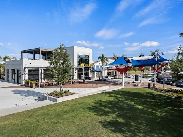 17565 Opal Sand Dr Unit 403, Venice, FL 34293 - view of home's community featuring a lawn