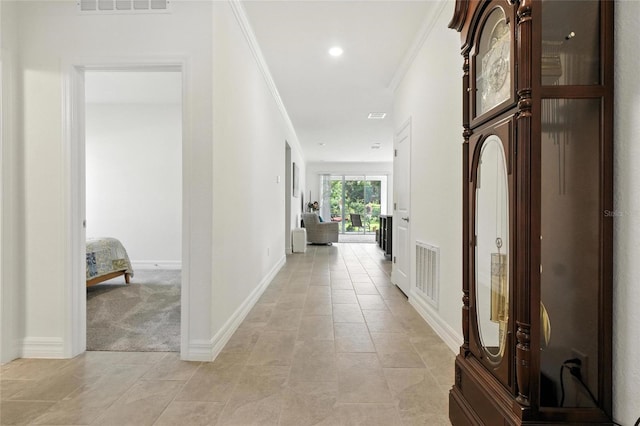 2456 Nabble Ln, North Port, FL 34288 - hallway with crown molding, recessed lighting, and light tile patterned flooring