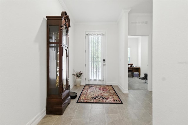 2456 Nabble Ln, North Port, FL 34288 - foyer with ornamental molding and tile patterned flooring