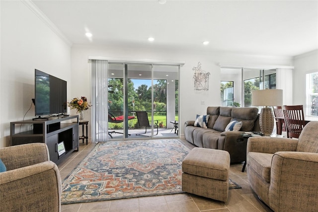 2456 Nabble Ln, North Port, FL 34288 - living room featuring crown molding and recessed lighting