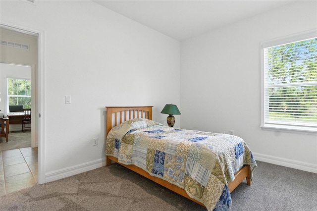 2456 Nabble Ln, North Port, FL 34288 - bedroom featuring carpet flooring and multiple windows