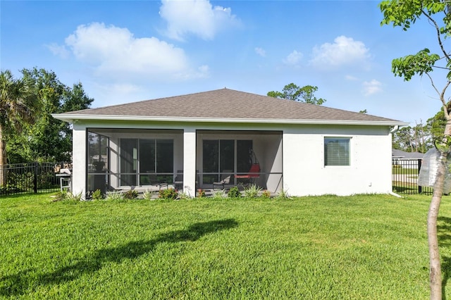 2456 Nabble Ln, North Port, FL 34288 - rear view of house with a sunroom and stucco siding