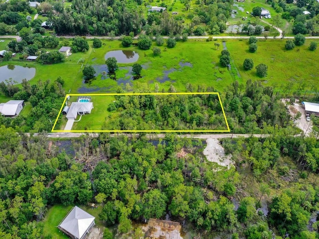 9761 Councilor Ln, North Fort Myers, FL 33917 - aerial overview of property's location featuring a large body of water and property parcel outlined
