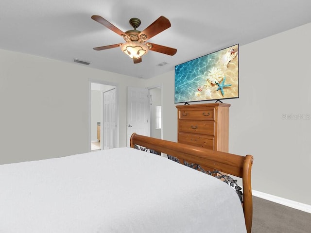 9761 Councilor Ln, North Fort Myers, FL 33917 - carpeted bedroom with baseboards and ceiling fan