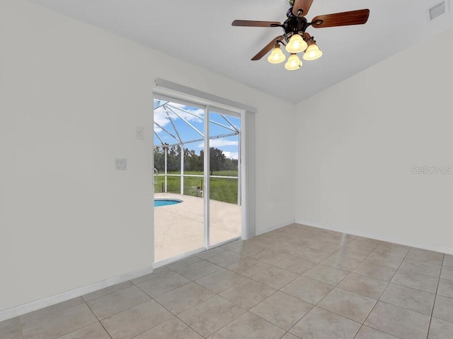 9761 Councilor Ln, North Fort Myers, FL 33917 - empty room with a sunroom, ceiling fan, and light tile patterned floors
