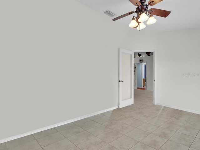 9761 Councilor Ln, North Fort Myers, FL 33917 - empty room with a ceiling fan and light tile patterned floors