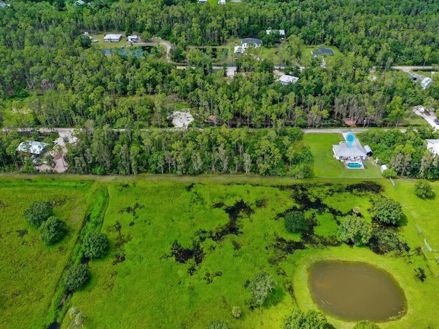 9761 Councilor Ln, North Fort Myers, FL 33917 - drone / aerial view of a heavily wooded area