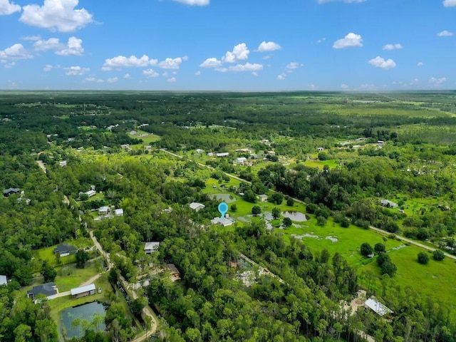 9761 Councilor Ln, North Fort Myers, FL 33917 - aerial view of property and surrounding area with a heavily wooded area