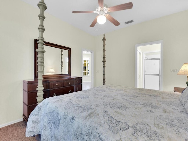 2040 Embarcadero Way N, Fort Myers, FL 33917 - bedroom with carpet, ceiling fan, and white refrigerator