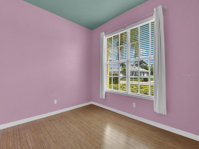 2040 Embarcadero Way N, Fort Myers, FL 33917 - spare room featuring baseboards and wood finished floors