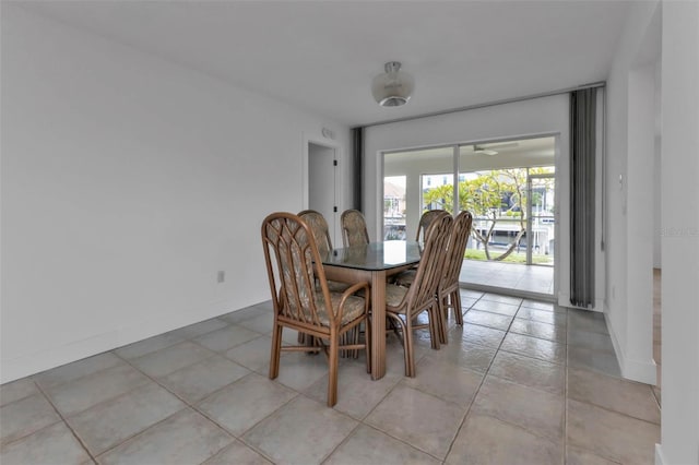 16 Tropicana Dr, Punta Gorda, FL 33950 - dining area with light tile patterned flooring and a ceiling fan