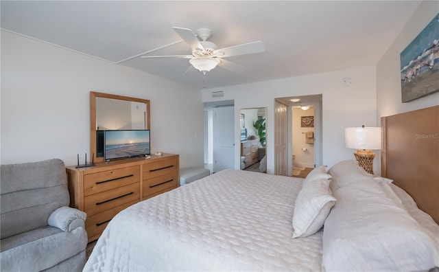 1080 Bal Harbor Blvd Unit 5B, Punta Gorda, FL 33950 - bedroom featuring ceiling fan and ensuite bath