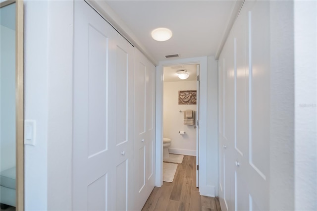 1080 Bal Harbor Blvd Unit 5B, Punta Gorda, FL 33950 - hall with light wood finished floors and baseboards