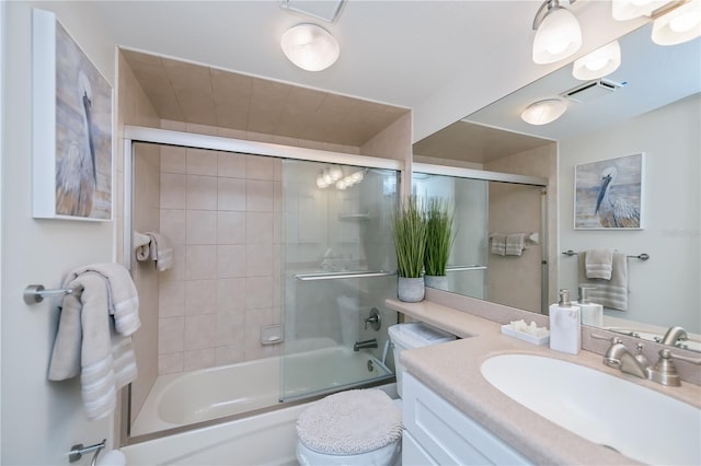 1080 Bal Harbor Blvd Unit 5B, Punta Gorda, FL 33950 - bathroom featuring vanity and combined bath / shower with glass door