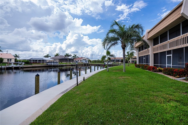 1080 Bal Harbor Blvd Unit 5B, Punta Gorda, FL 33950 - dock featuring a water view, a yard, and a residential view