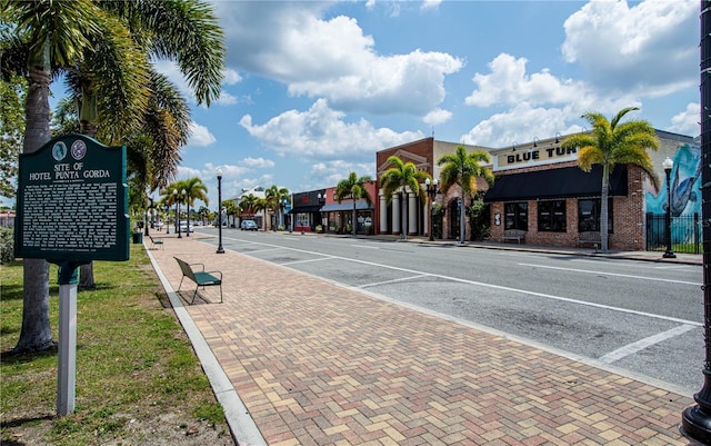 1080 Bal Harbor Blvd Unit 5B, Punta Gorda, FL 33950 - view of asphalt road featuring sidewalks, street lighting, and curbs