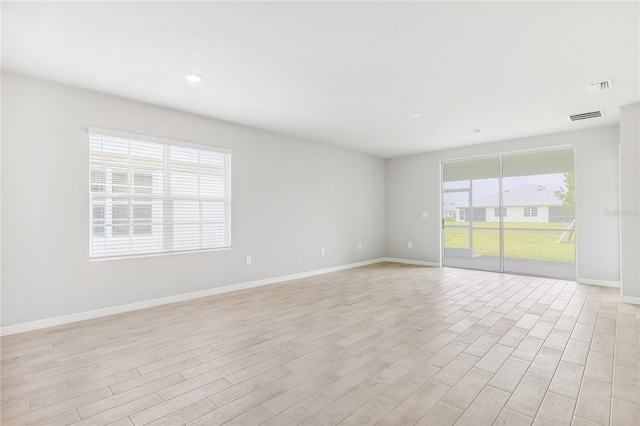 2047 Royal Tern Cir, Punta Gorda, FL 33983 - unfurnished room with light wood-style flooring and recessed lighting