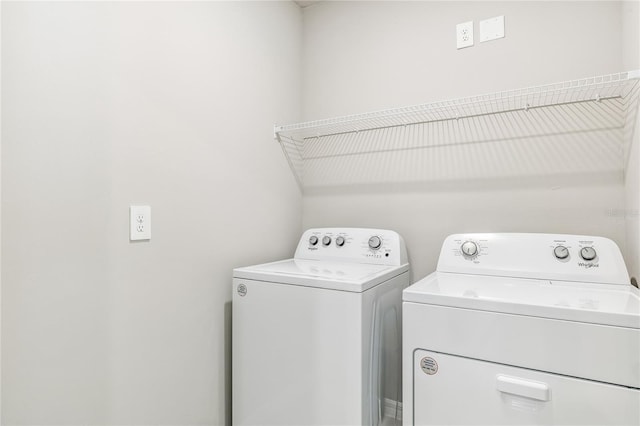 2047 Royal Tern Cir, Punta Gorda, FL 33983 - washroom featuring washing machine and clothes dryer