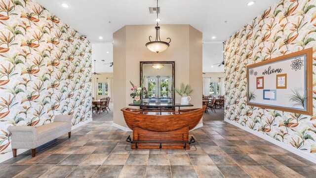 2047 Royal Tern Cir, Punta Gorda, FL 33983 - interior space with wallpapered walls and recessed lighting