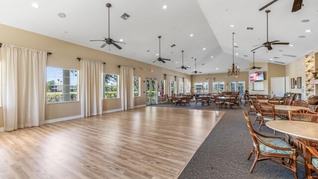 2047 Royal Tern Cir, Punta Gorda, FL 33983 - dining room with ceiling fan, high vaulted ceiling, healthy amount of natural light, light wood-type flooring, and recessed lighting