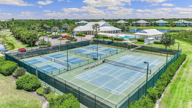 2047 Royal Tern Cir, Punta Gorda, FL 33983 - view of tennis court with a water view