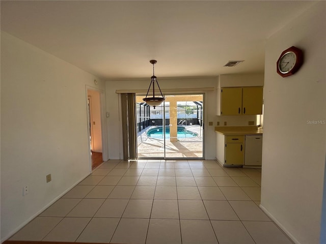 4222 Cockrell St, Port Charlotte, FL 33948 - unfurnished dining area with light tile patterned floors and baseboards