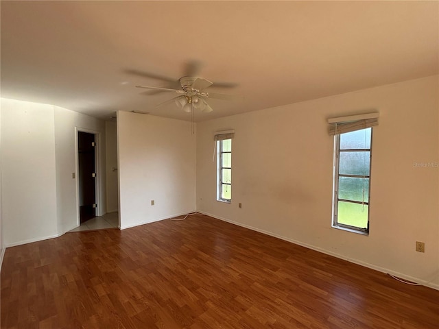 4222 Cockrell St, Port Charlotte, FL 33948 - spare room with dark wood-style flooring and a ceiling fan