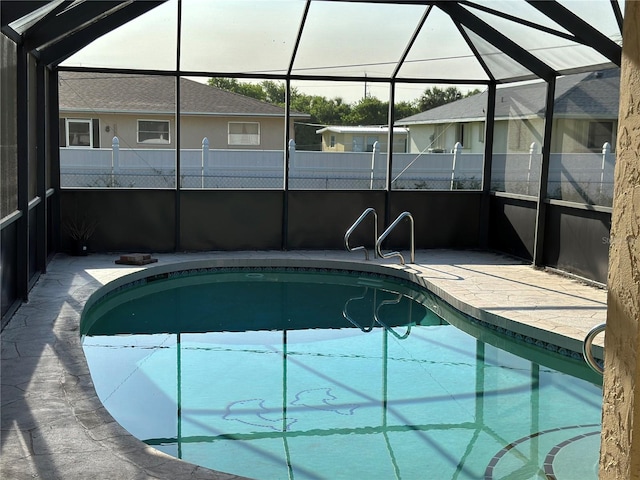 4222 Cockrell St, Port Charlotte, FL 33948 - swimming pool featuring a patio and glass enclosure