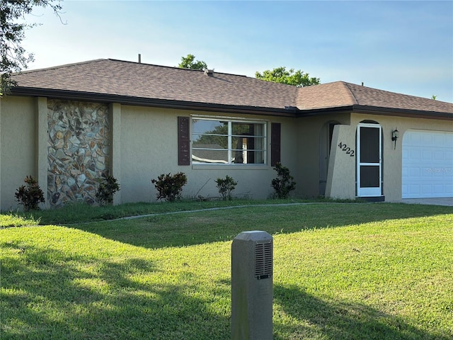 4222 Cockrell St, Port Charlotte, FL 33948 - single story home with an attached garage, a front yard, and stucco siding