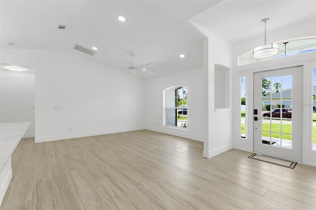 2399 Redstone Ave, North Port, FL 34288 - foyer with plenty of natural light, ceiling fan, lofted ceiling, light wood-style floors, and recessed lighting