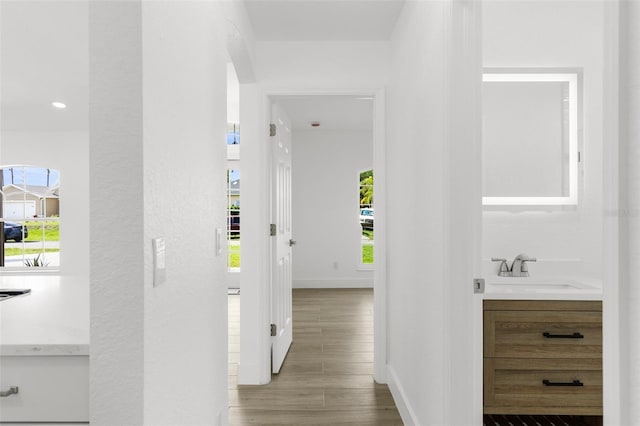 2399 Redstone Ave, North Port, FL 34288 - corridor with wood finished floors and recessed lighting